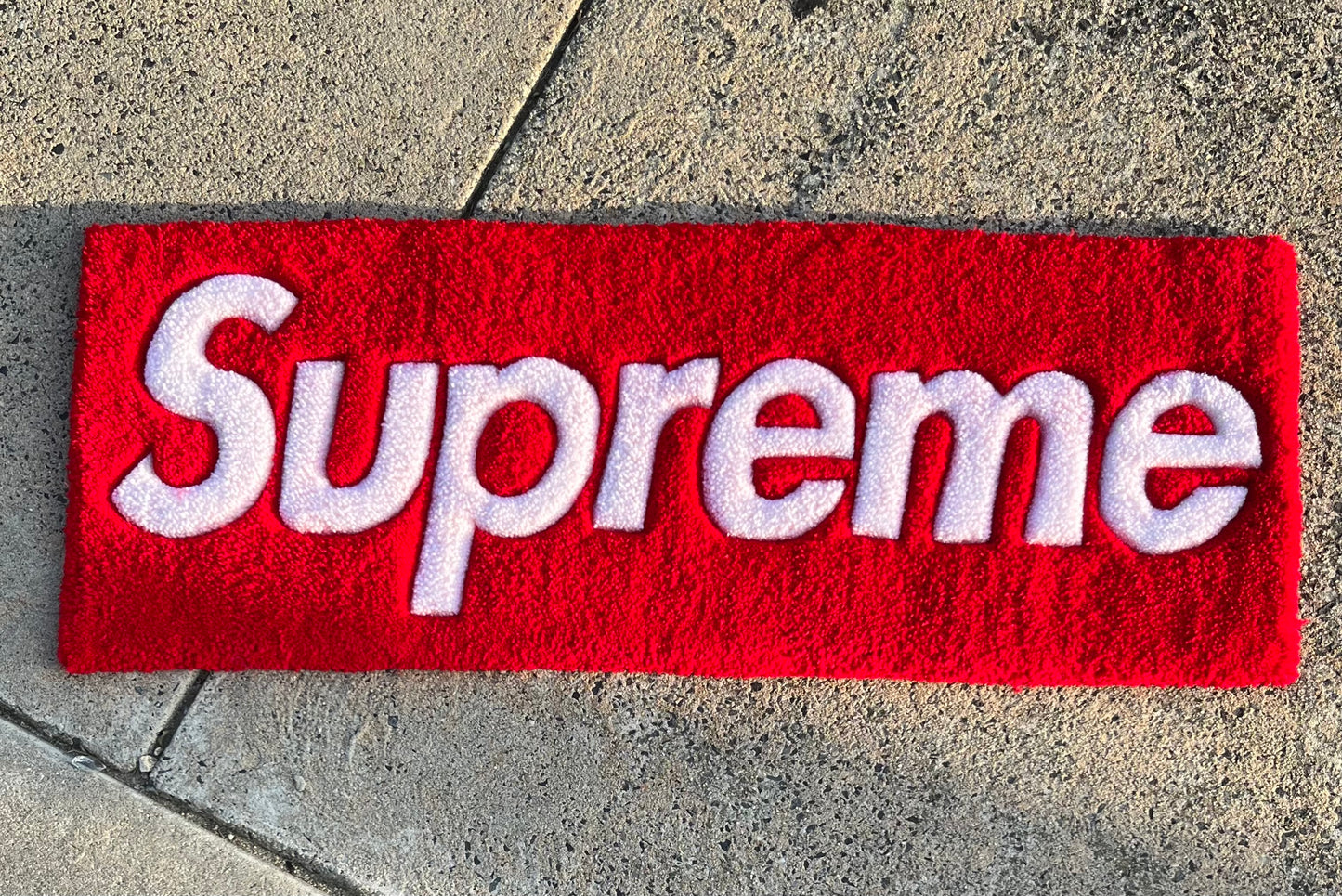 "Supreme" Rug